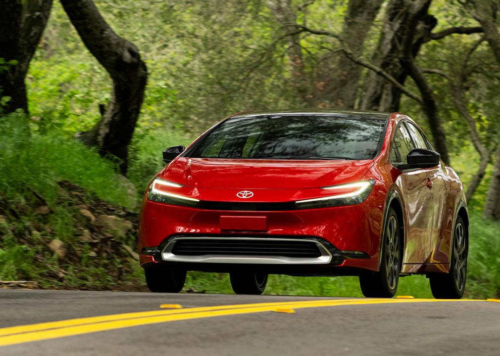 The safest cars in 2025 A red 2025 Toyota Prius on the road.